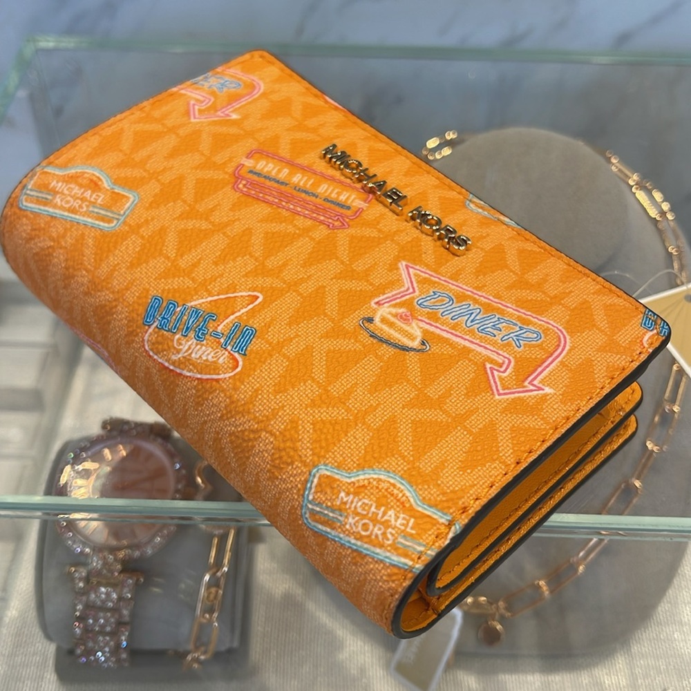 Michael Kors Jet Set Travel Md Printed Signature Logo Bi-Fold Wallet
Pop Orange - Picture 8 of 16